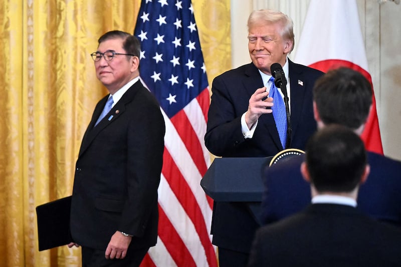 President Donald Trump and Japanese Prime Minister Shigeru Ishiba arrive for a joint press conference in the East Room of the White House in Washington, Feb. 7, 2025.