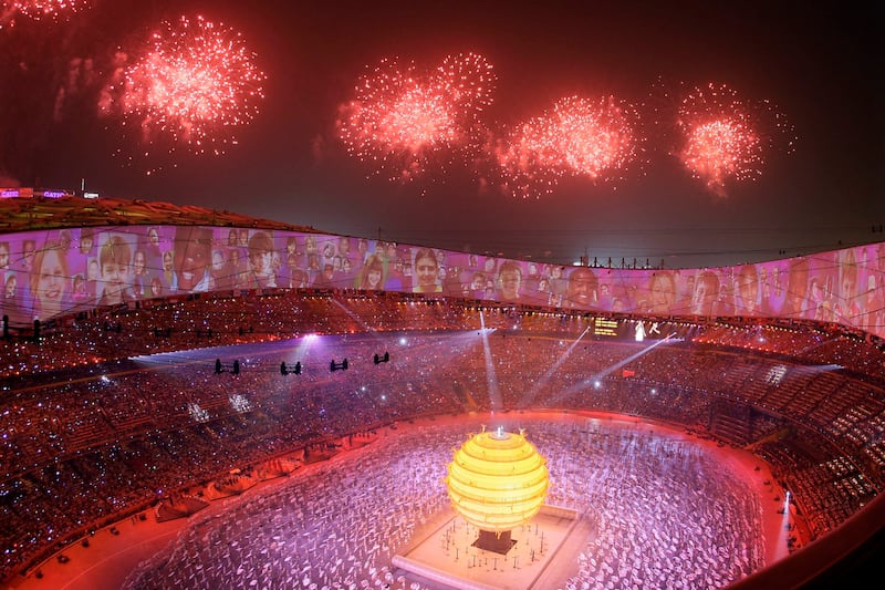 Fireworks explode over the National Stadium during the opening ceremony for the Beijing 2008 Olympics in Beijing on Aug. 8, 2008. Credit: Associated Press