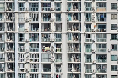 View of a residential building during a COVID-19 lockdown in the Jing'an district in Shanghai, April 8, 2022. Credit: AFP