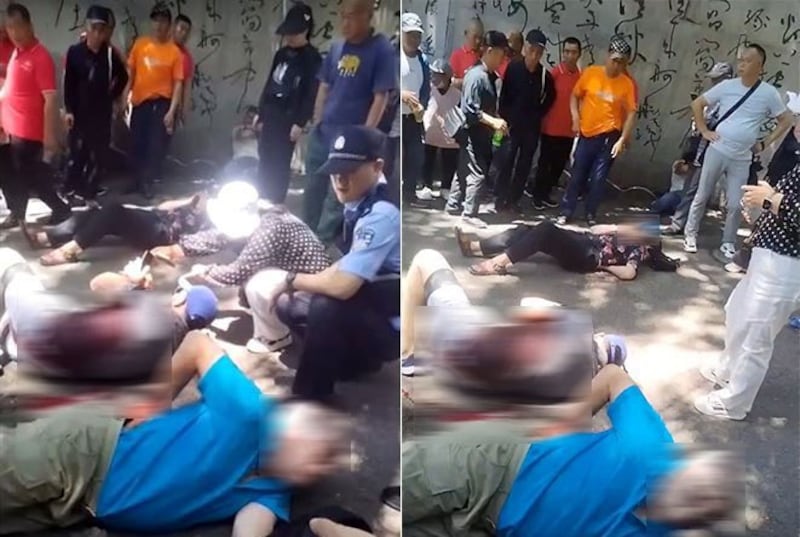 在吉林市北山公园内遇刺的美国康奈尔学院4位教师躺倒在地,各人手扶腰后部伤口。( via REUTERS)